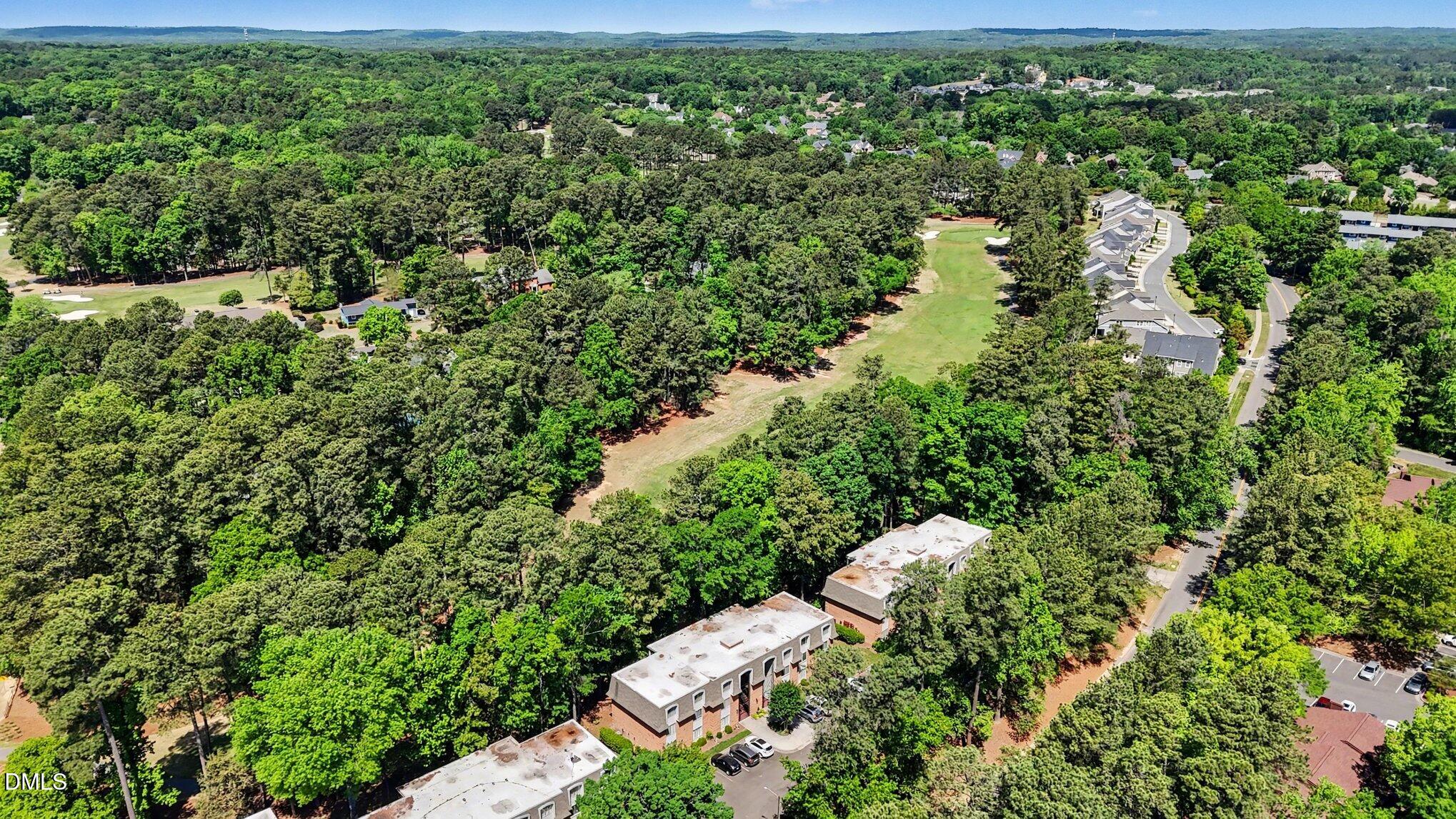1911 Front Street, Unit 3B Durham, NC 27705 - Photo 31 of 33 an aerial view of residential house with outdoor space and trees all around