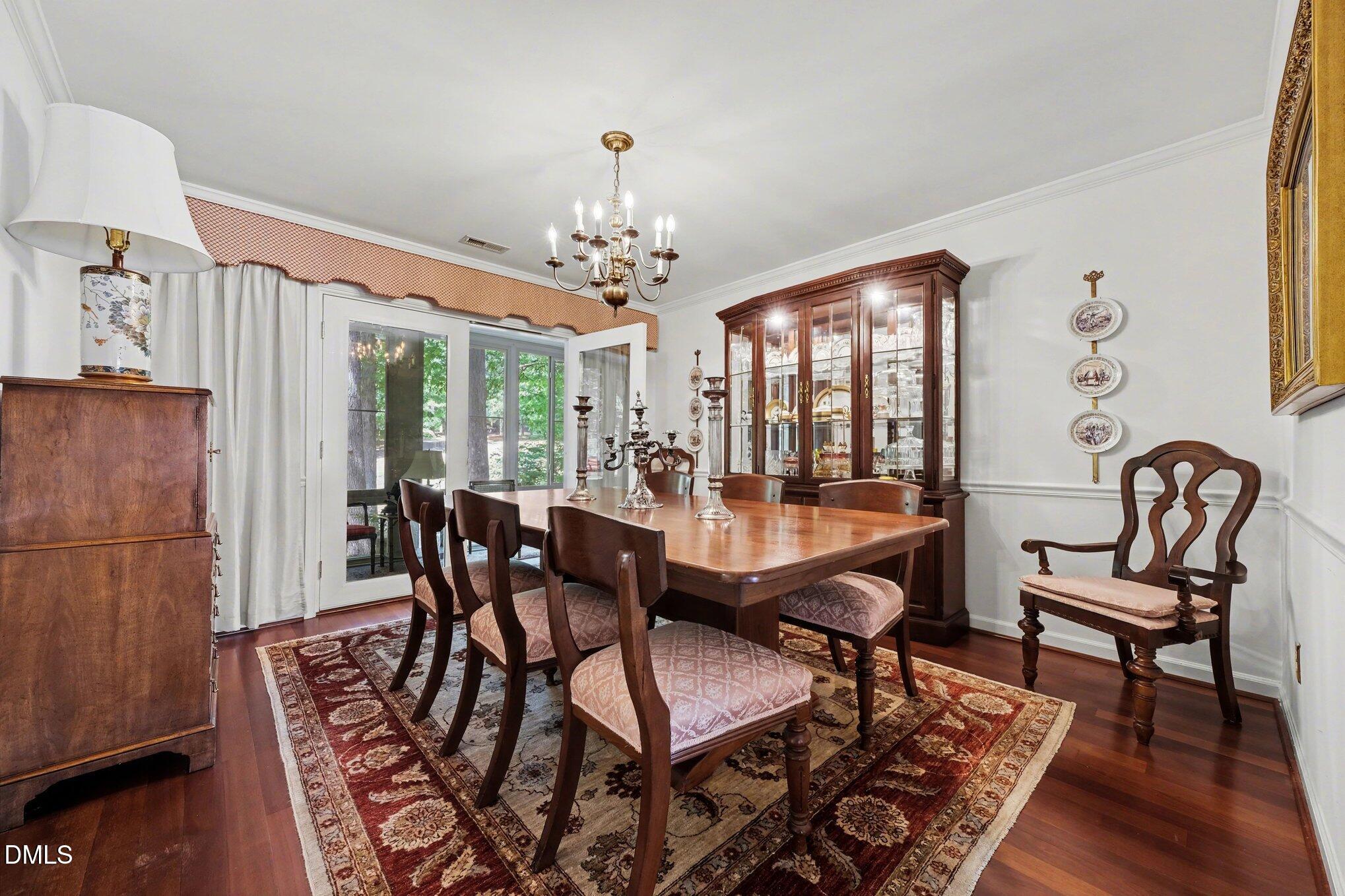 1911 Front Street, Unit 3B Durham, NC 27705 - Photo 5 of 33 a view of a dining room with furniture window and wooden floor