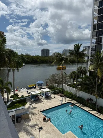 a view of a lake with sitting area