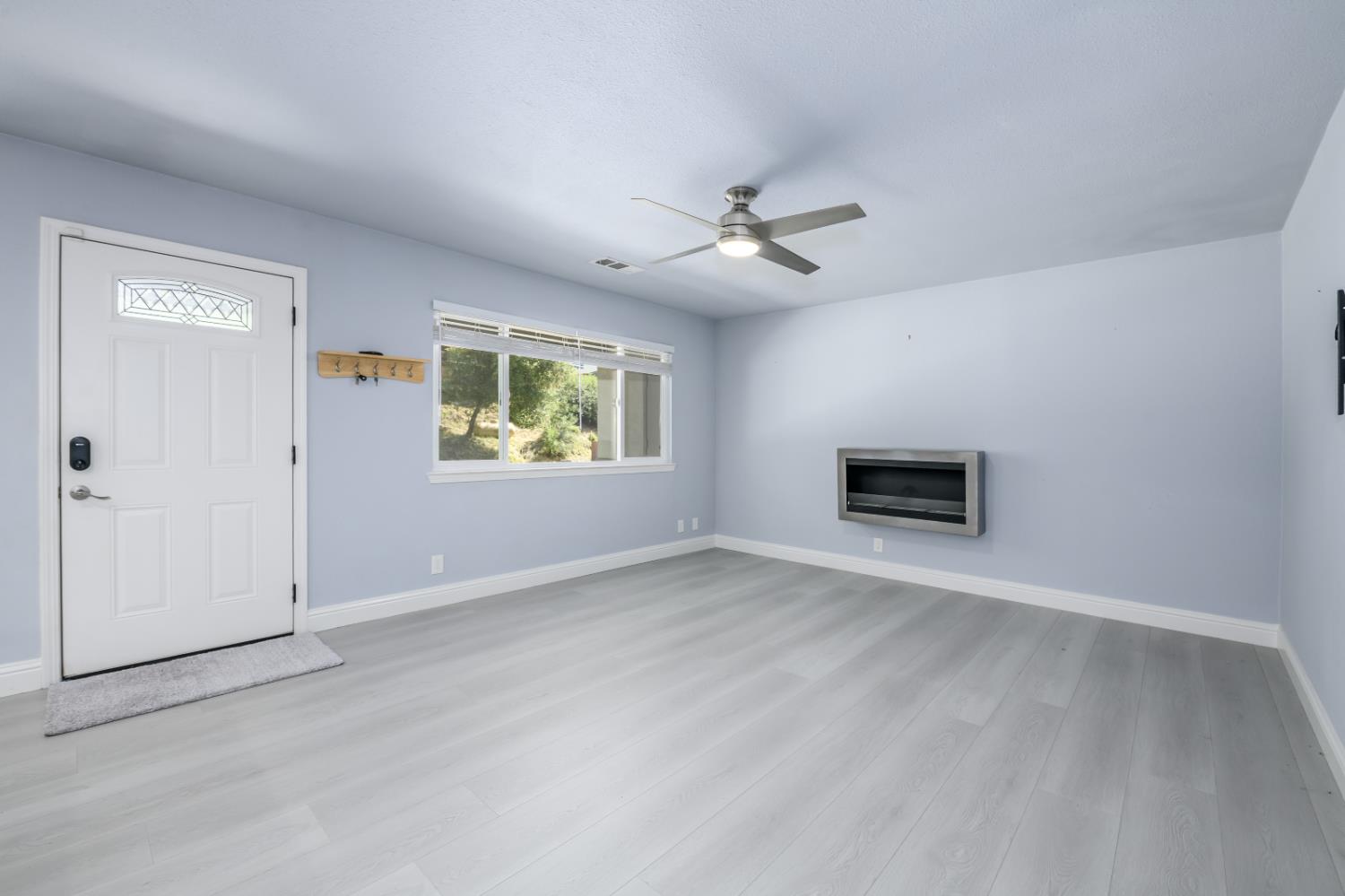 2873 Anderson Way Placerville, CA 95667 - Photo 5 of 24 a view of empty room with windows