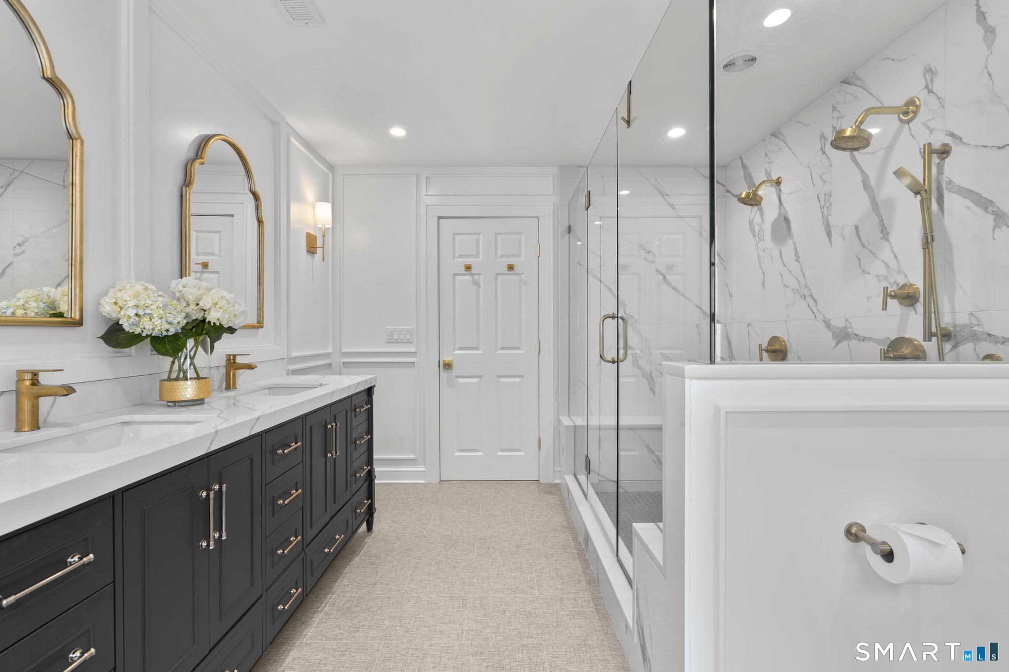 181 Old Branchville Road Ridgefield, CT 06877 - Photo 24 of 40 a spacious bathroom with a granite countertop sink a mirror and shower