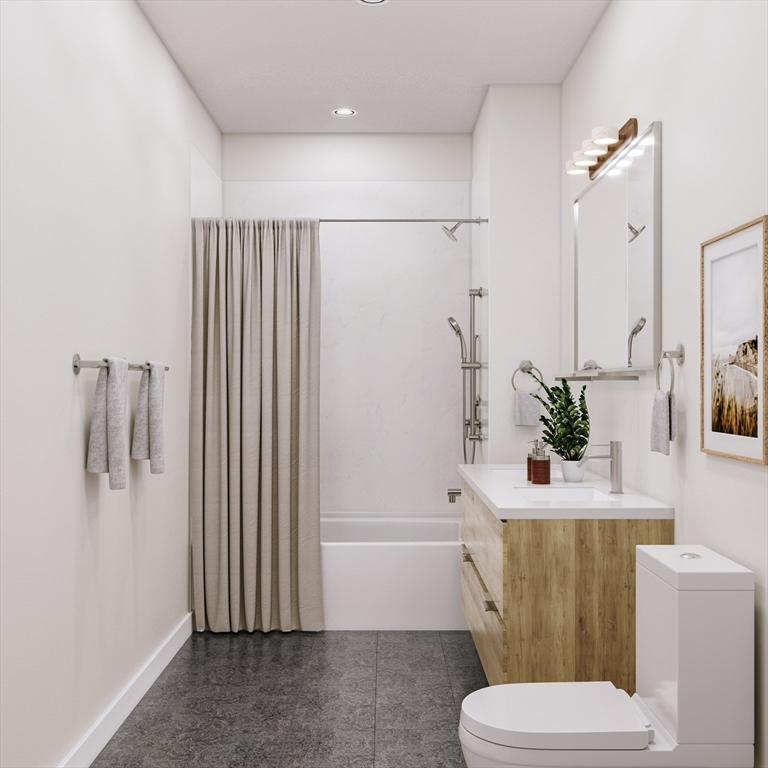 25 Adams Circle, Unit B Devens, MA 01434 - Photo 14 of 22 a bathroom with a toilet and a shower