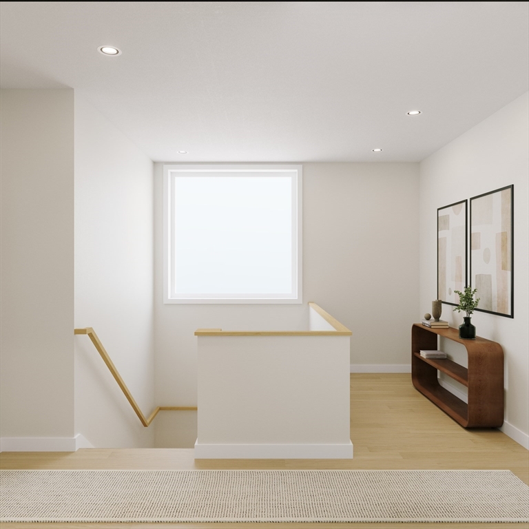 25 Adams Circle, Unit B Devens, MA 01434 - Photo 15 of 22 a living room with a couch and a table