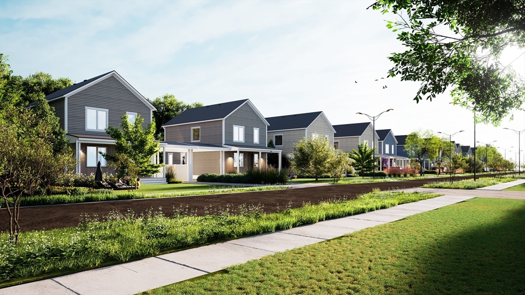 25 Adams Circle, Unit B Devens, MA 01434 - Photo 22 of 22 a front view of a house with a yard