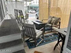 a dining room with furniture and wooden floor