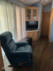 a bedroom with a bed and cabinets