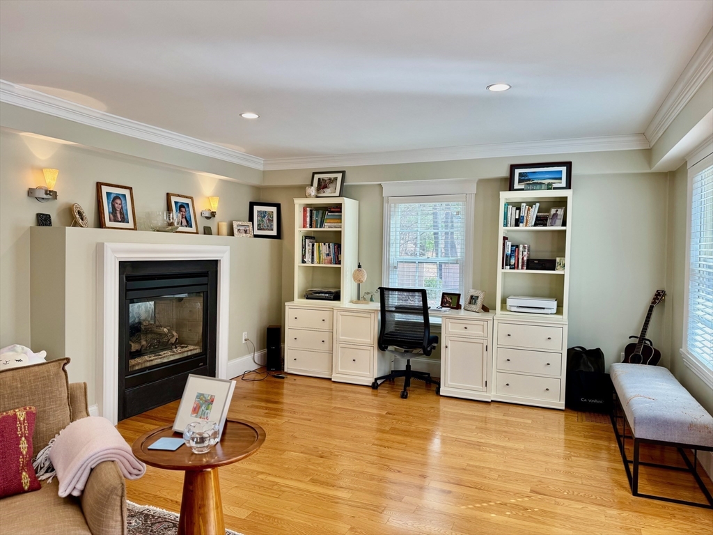 601 Lexington Road Concord, MA 01742 - Photo 7 of 16 a living room with furniture and a fireplace