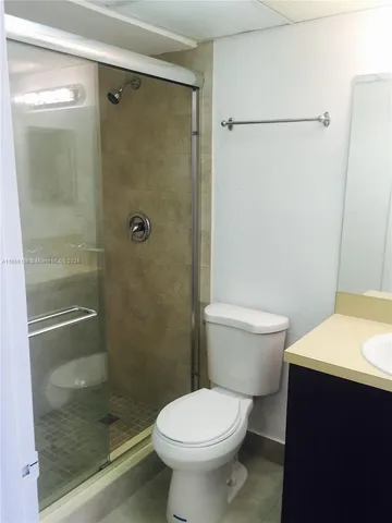 a bathroom with a sink and a toilet