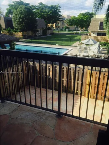 a view of street from a balcony