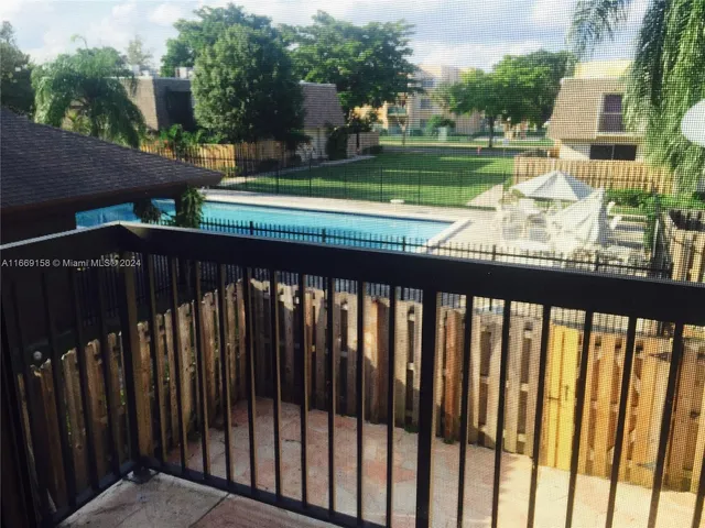 a view of deck with a yard