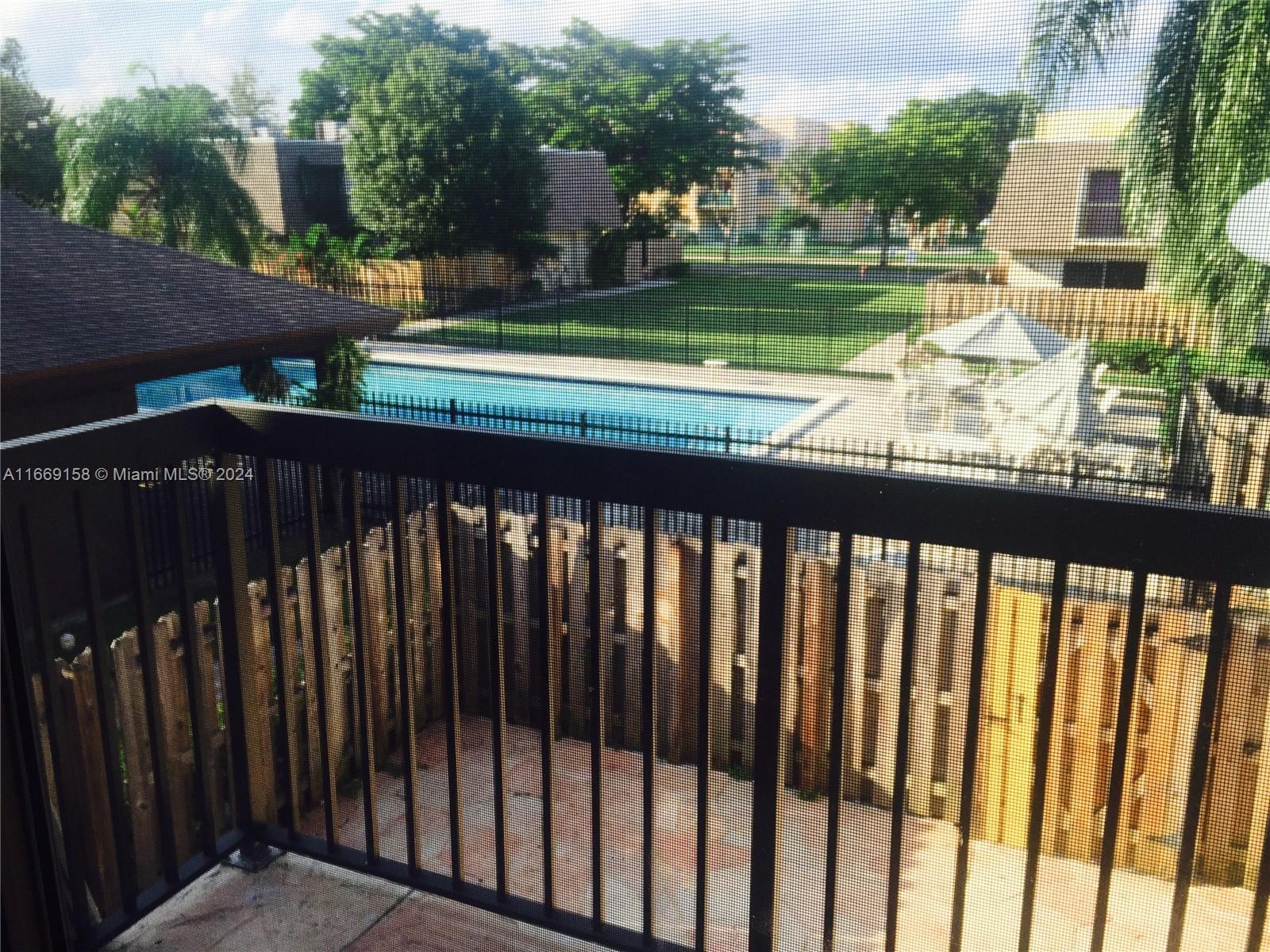 8205 Southwest 23rd Court, Unit 21A North Lauderdale, FL 33068 - Photo 19 of 23 a view of deck with a yard