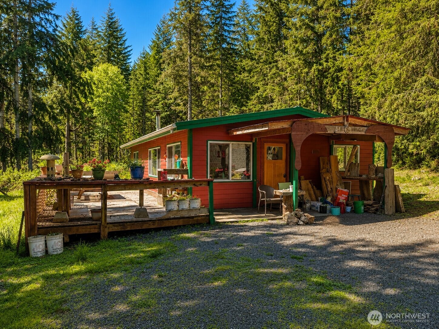231 East Strong Road Shelton, WA 98584 - Photo 6 of 13 a front view of a house with garden
