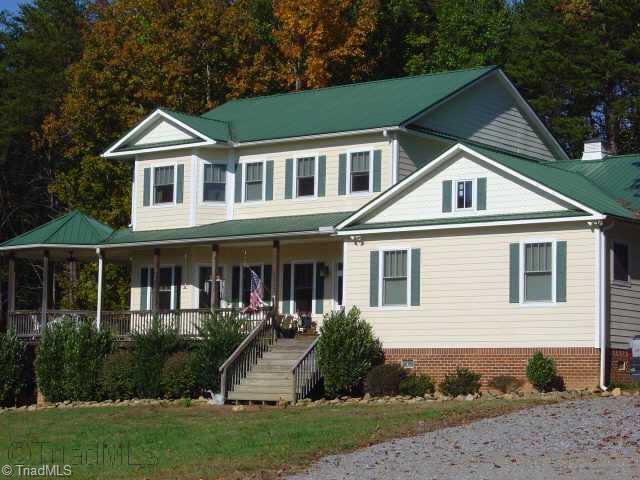 8121 Shoeline Road Stokesdale, NC 27357 - Photo 1 of 9 Exterior Front.
