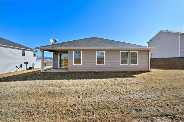 a house view with a backyard space