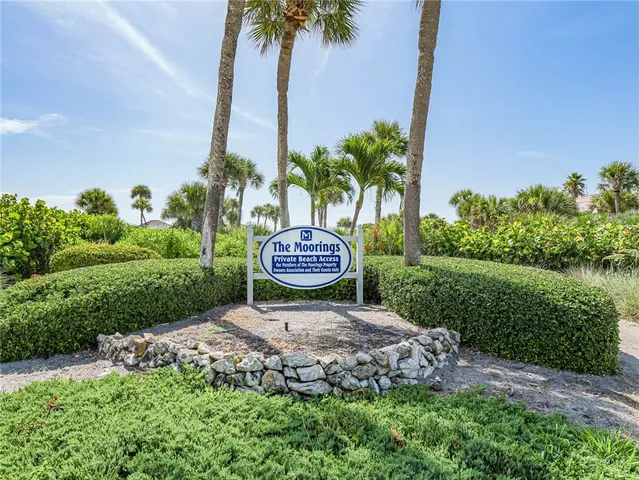 a view of a garden with a tree and a park
