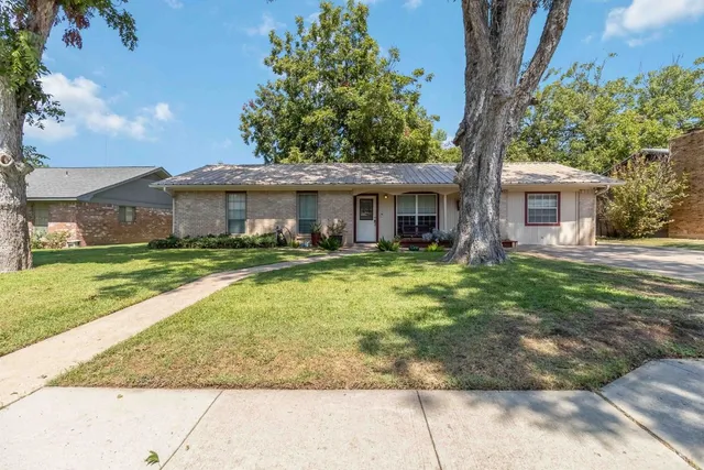 a view of a house with a swimming pool