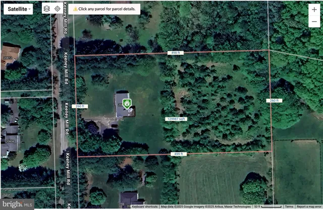 a living room with a couch and a window