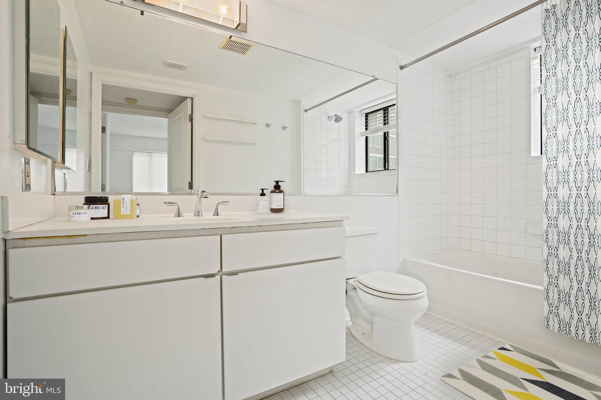1225 13th Street Northwest, Unit 306 Washington, DC 20005 - Photo 12 of 23 Large and bright bathroom - virtually staged