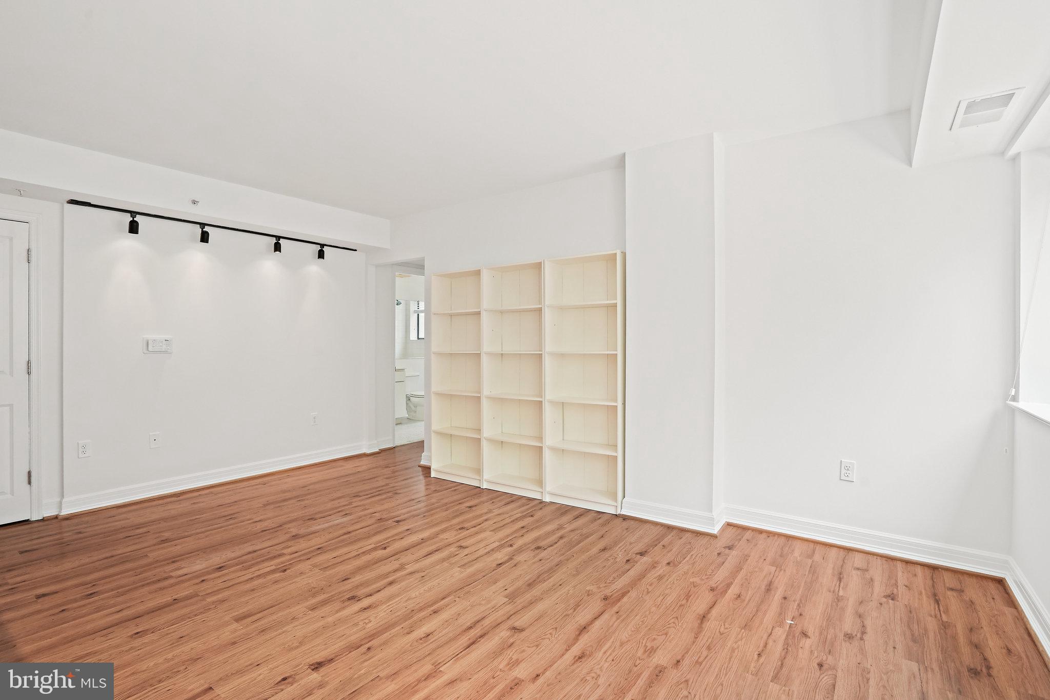 1225 13th Street Northwest, Unit 306 Washington, DC 20005 - Photo 3 of 23 Living area with picture lights