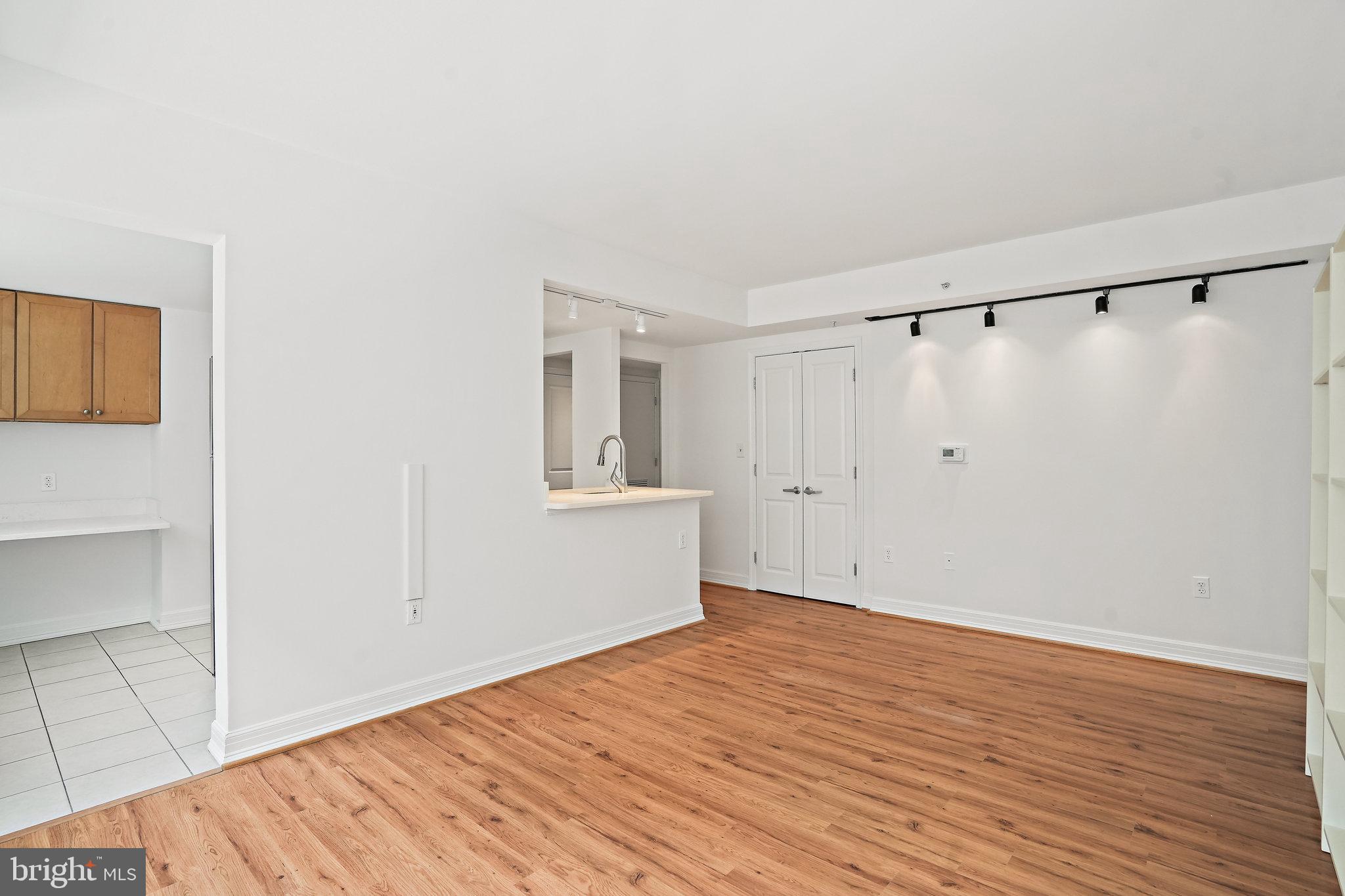 1225 13th Street Northwest, Unit 306 Washington, DC 20005 - Photo 5 of 23 Living area with picture lights