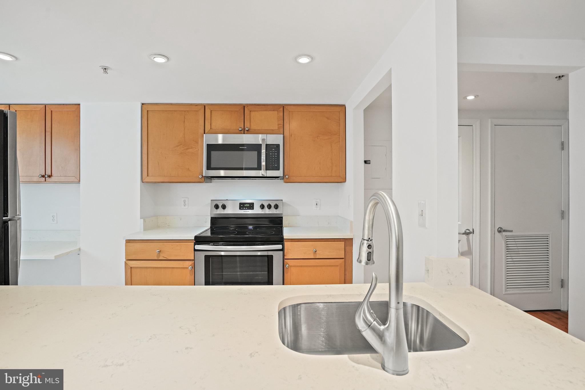 1225 13th Street Northwest, Unit 306 Washington, DC 20005 - Photo 9 of 23 Kitchen view from island