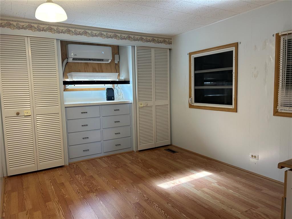 5325 Boca Raton Avenue Sarasota, FL 34234 - Photo 13 of 50 a view of an empty room with cabinet and a window