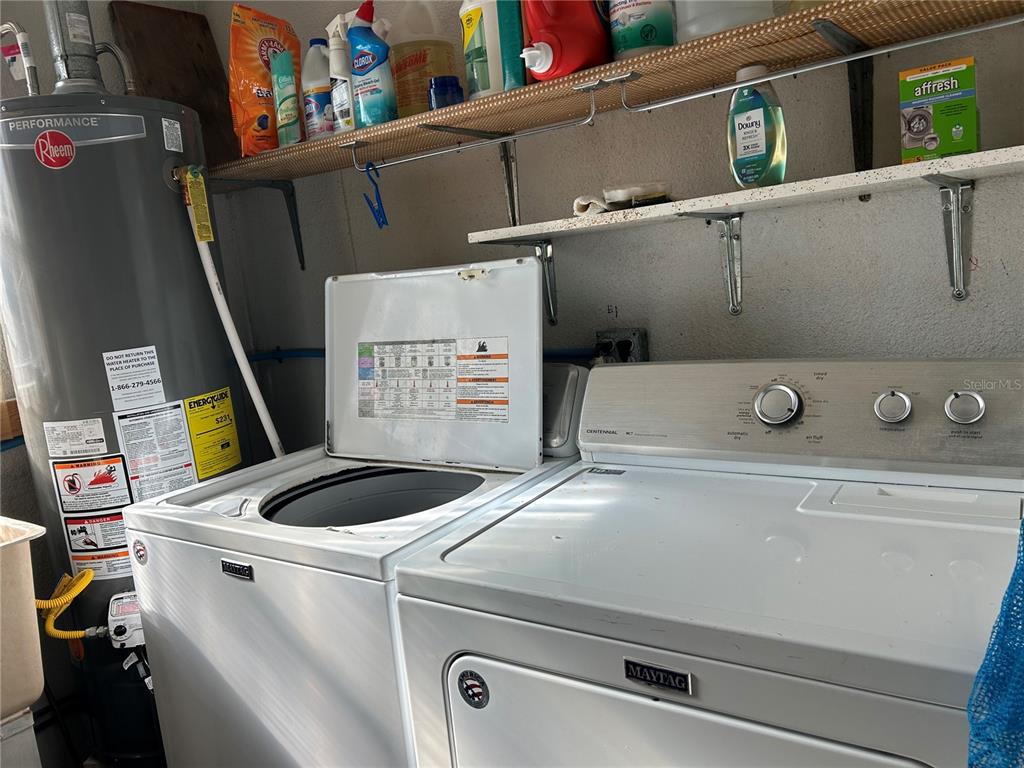 5325 Boca Raton Avenue Sarasota, FL 34234 - Photo 18 of 50 a close up of a sink with washer and dryer