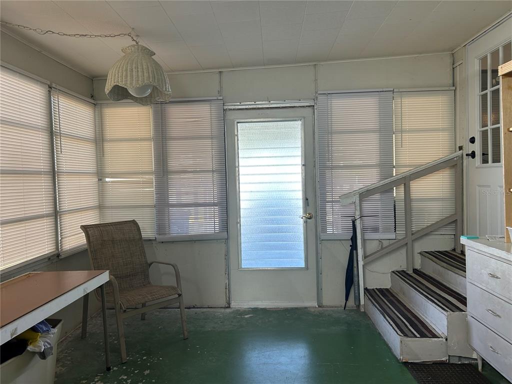 5325 Boca Raton Avenue Sarasota, FL 34234 - Photo 22 of 50 a view of entryway and hall with wooden floor