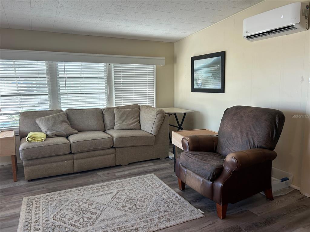 5325 Boca Raton Avenue Sarasota, FL 34234 - Photo 3 of 50 a living room with furniture and a couch