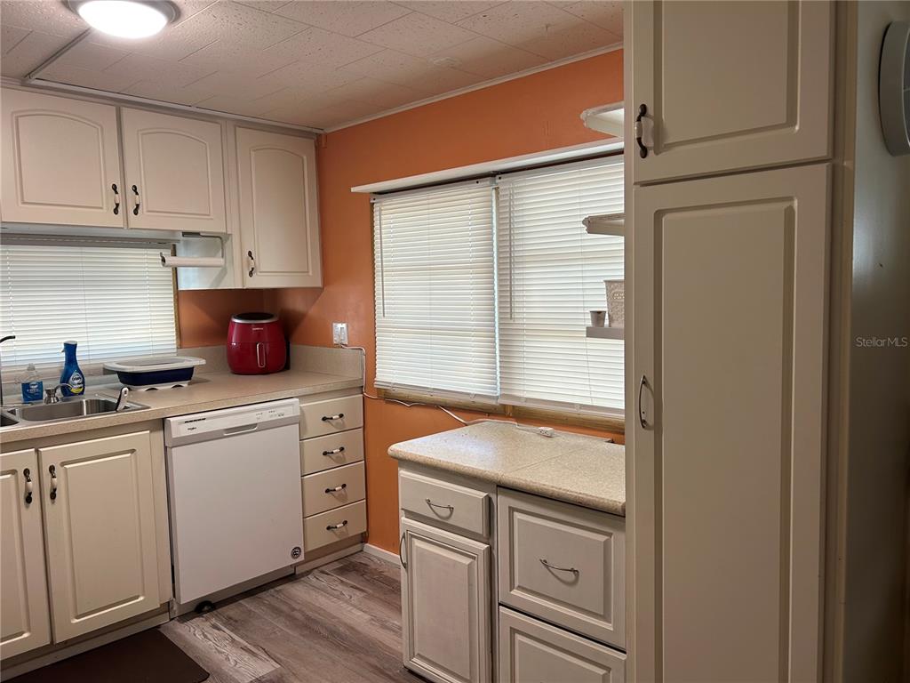 5325 Boca Raton Avenue Sarasota, FL 34234 - Photo 7 of 50 a kitchen with a sink and cabinets