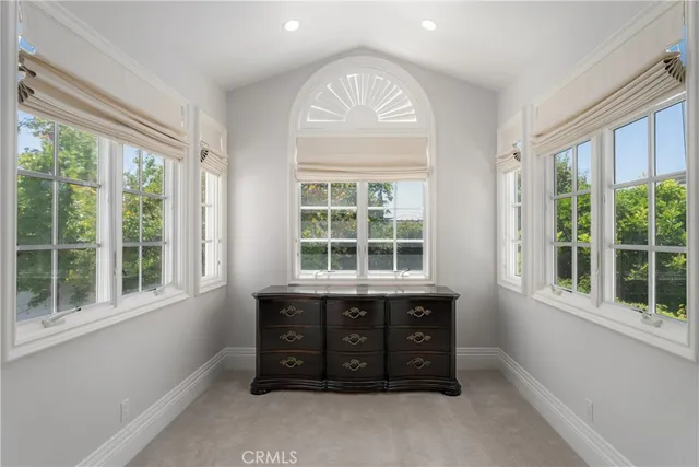 a spacious bathroom with a bathtub and a shower