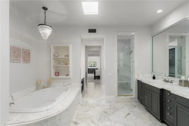 a kitchen with sink cabinets and window