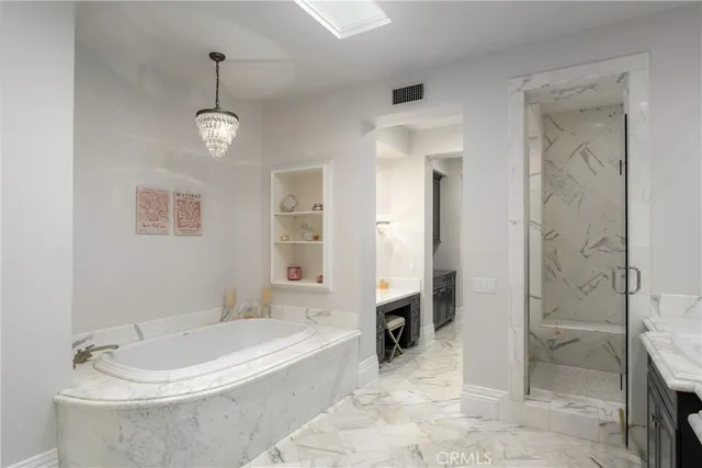 a view of a hallway with paintings on the wall