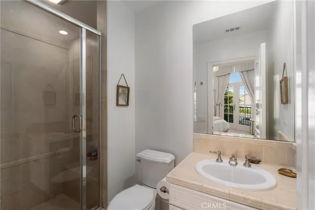 a view of a house with pool and chairs