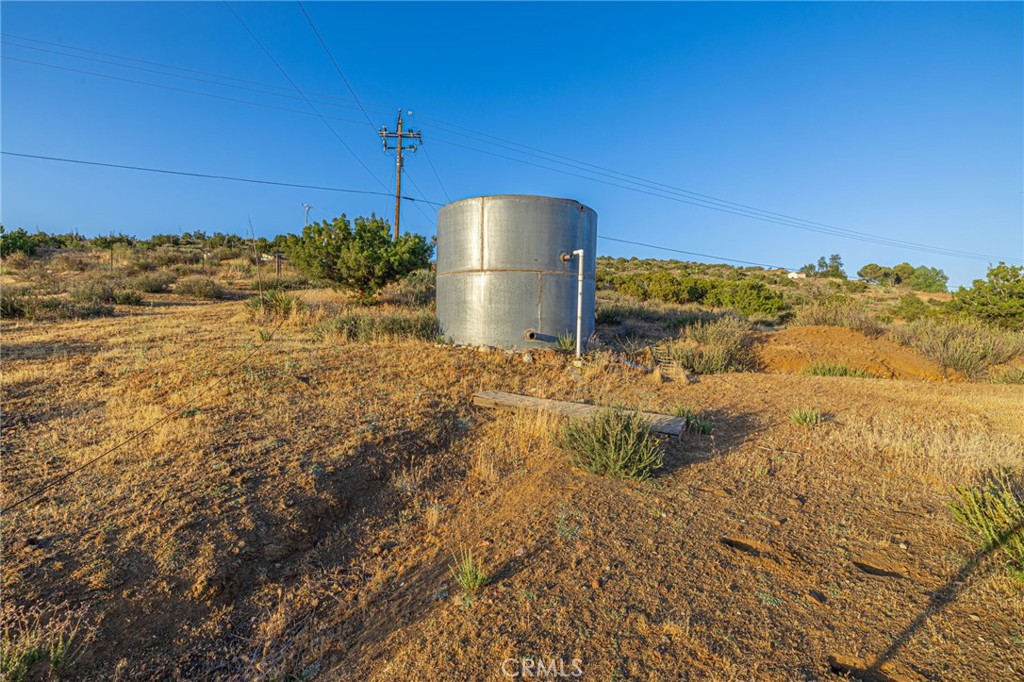 6780 Hubbard Road Acton, CA 93510 - Photo 22 of 36 a view of a yard with an ocean view