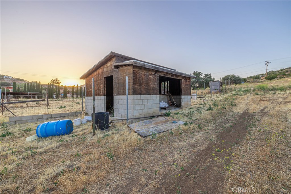 6780 Hubbard Road Acton, CA 93510 - Photo 32 of 36 a view of a house with backyard