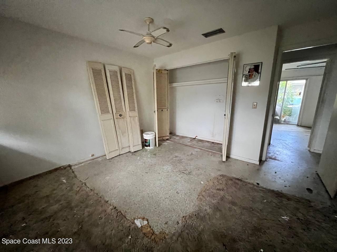 949 Levitt Parkway Rockledge, FL 32955 - Photo 2 of 5 wooden floor in an empty room
