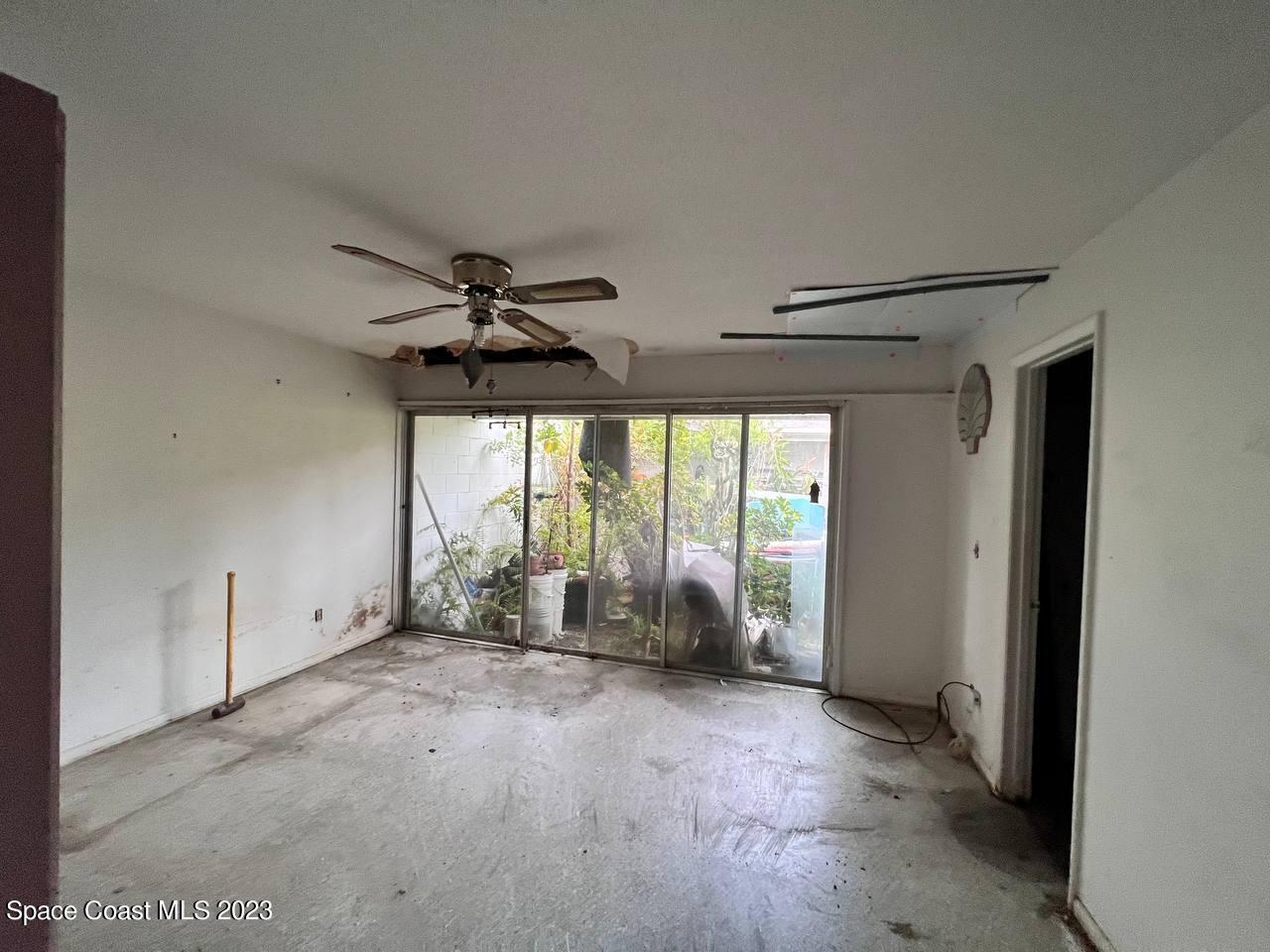 949 Levitt Parkway Rockledge, FL 32955 - Photo 3 of 5 a view of an empty room with a window