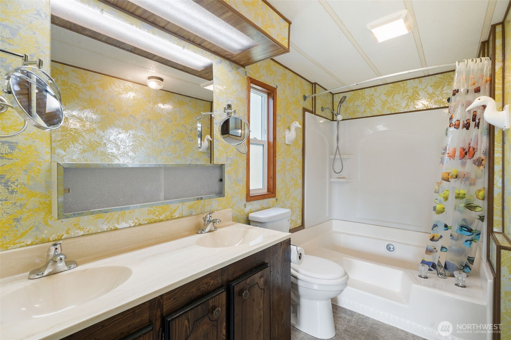 1171 E Trail Belfair, WA 98528 - Photo 9 of 29 a bathroom with a sink a toilet and shower