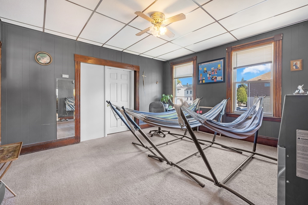 14 Mendon Street Worcester, MA 01604 - Photo 11 of 17 a living room with a couch and a table