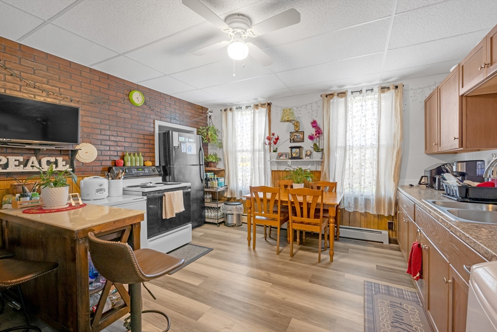 14 Mendon Street Worcester, MA 01604 - Photo 6 of 17 a dining room with furniture and window