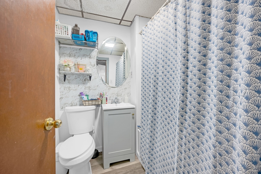 14 Mendon Street Worcester, MA 01604 - Photo 9 of 17 a bathroom with a toilet and a sink