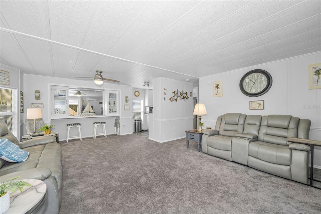 4454 Tucker Square New Port Richey, FL 34652 - Photo 16 of 64 a living room with furniture and wooden floor