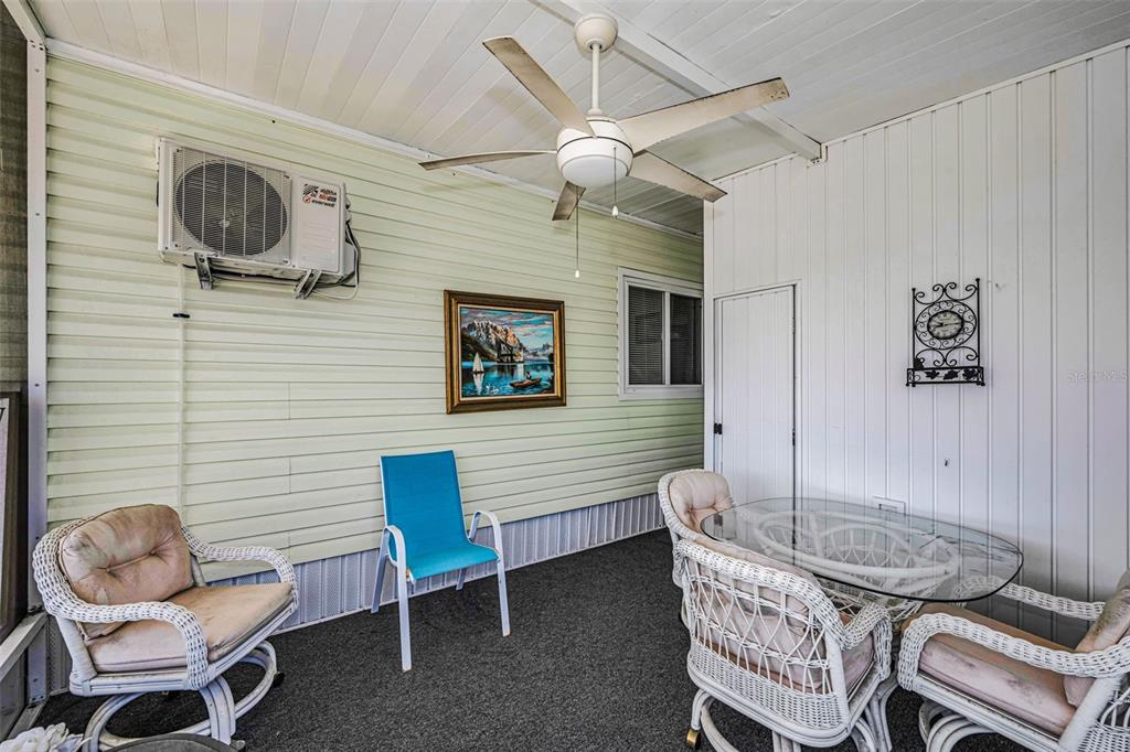 4454 Tucker Square New Port Richey, FL 34652 - Photo 32 of 64 a living room with furniture and a wooden floor