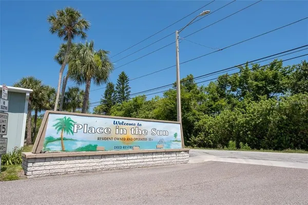 a sign on the side of the road