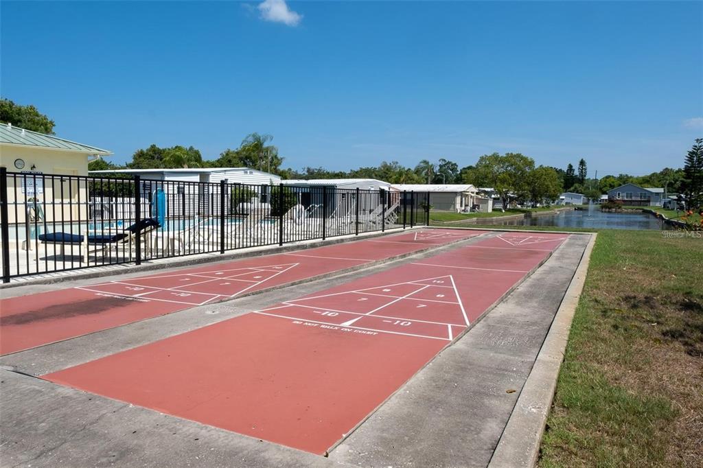 4454 Tucker Square New Port Richey, FL 34652 - Photo 44 of 64 a view of a tennis court