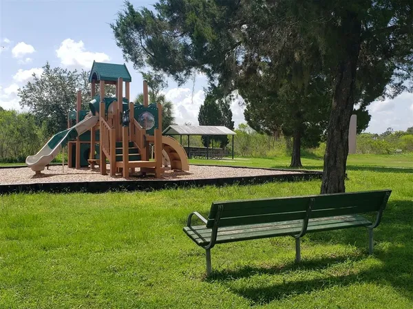 a view of street with sitting area
