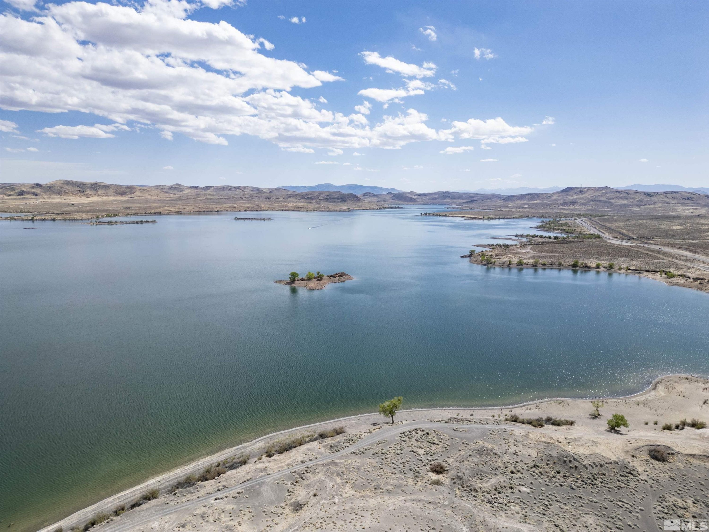 20144 Lahontan Dam Road Fallon, NV 89406 - Photo 13 of 35 a view of a lake with a mountain