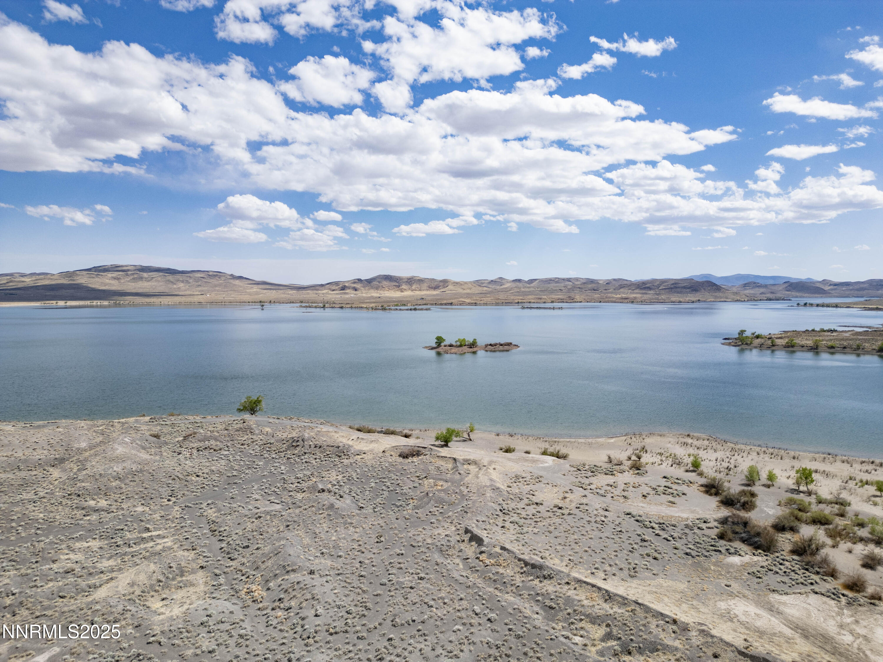 20144 Lahontan Dam Road Fallon, NV 89406 - Photo 22 of 35 a view of a lake with beach