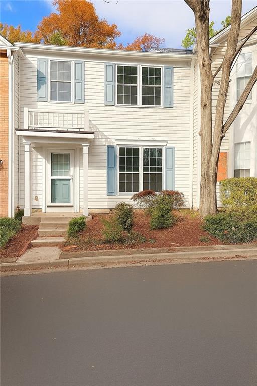 10900 Wittenridge Drive, Unit C7 Alpharetta, GA 30022 - Photo 1 of 31 a house with a outdoor space